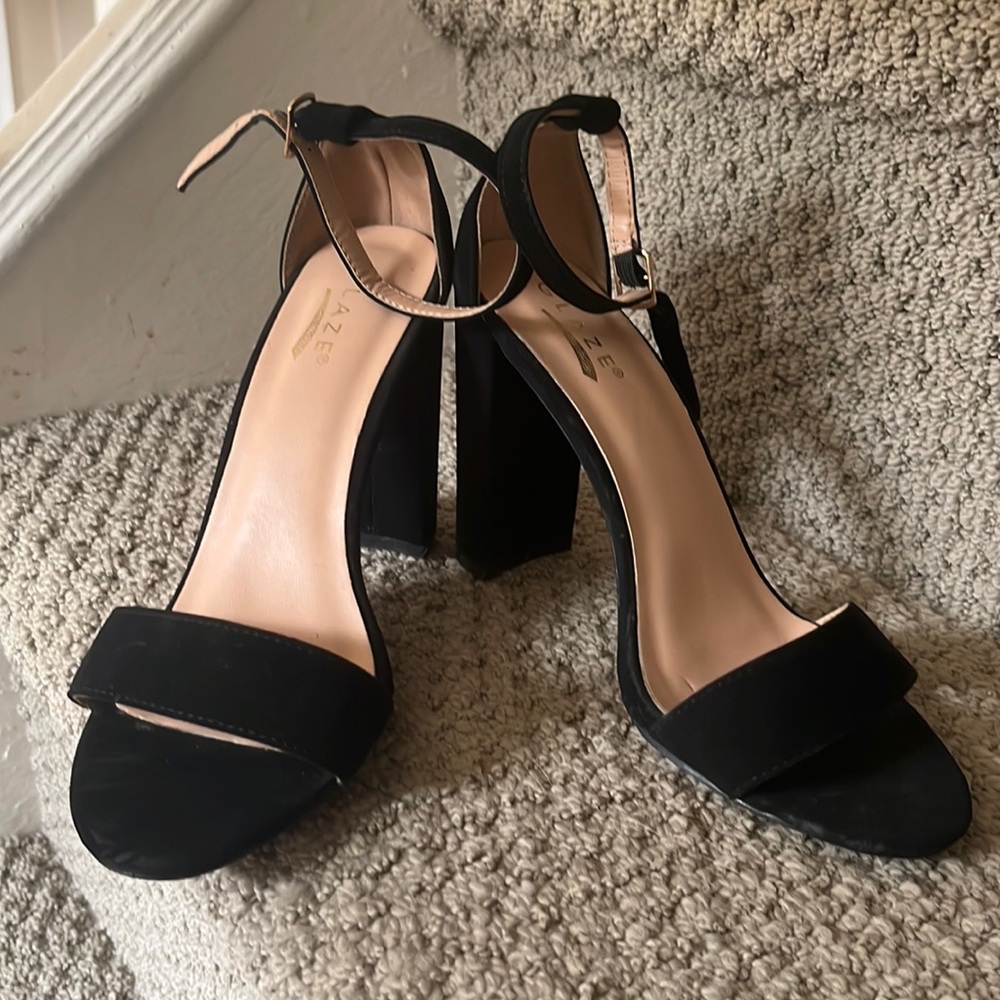 Lightly worn black heels